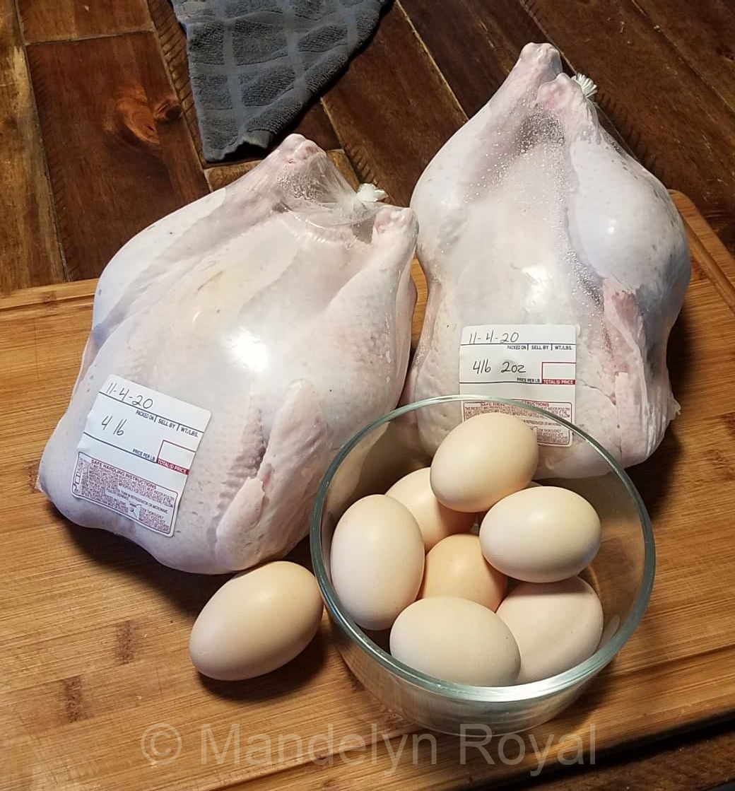 Two processed American Bresse chickens and eggs. Photo: Mandelyn Royal.