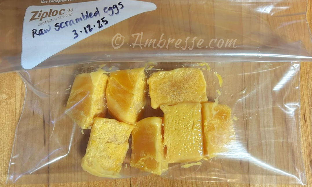 Seven frozen egg cubes, bagged for the freezer.