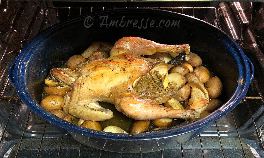 Stuffed American Bresse chicken on bed of homestead potatoes. Mmmm!