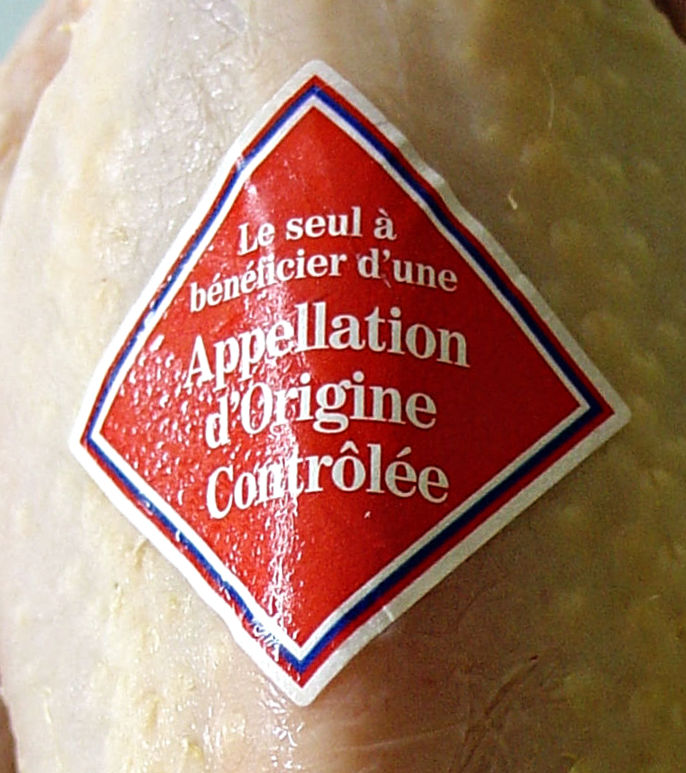 French Bresse chicken labeled with the famous "Appellation d'Origine Controlee," letting everyone know the poultry is honest-to-goodness finished Poulet de Bresse. Yum!