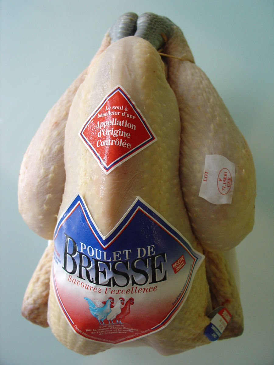 A "Bresse" chicken in a french market. Note the official logo and notice of "AOC."