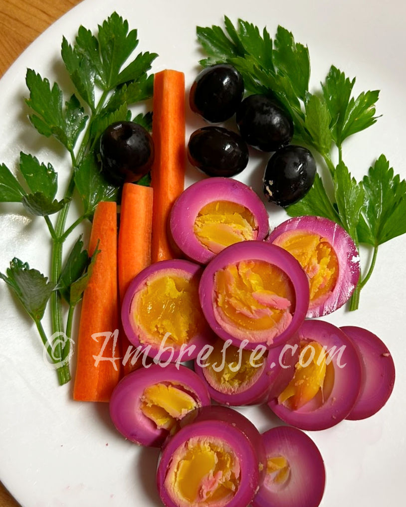 Plate of beet-pickled eggs and veggies.
