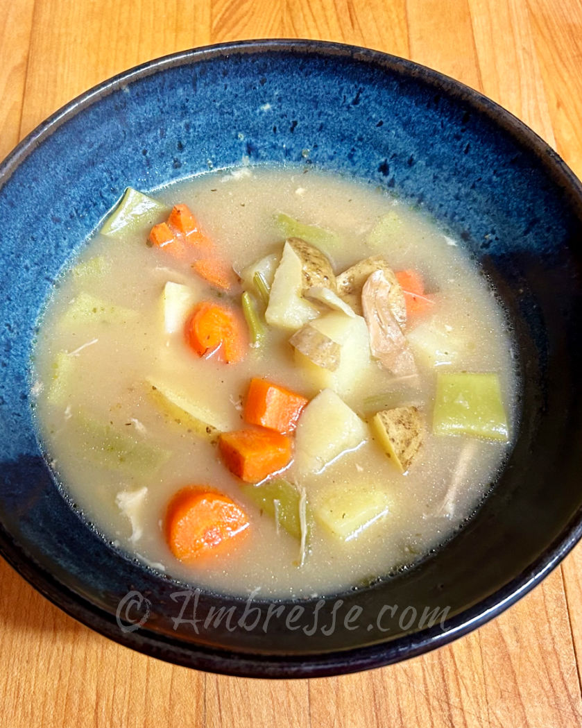 Bowl of delicious homemade chicken soup made with an American Bresse meat chicken (9305).