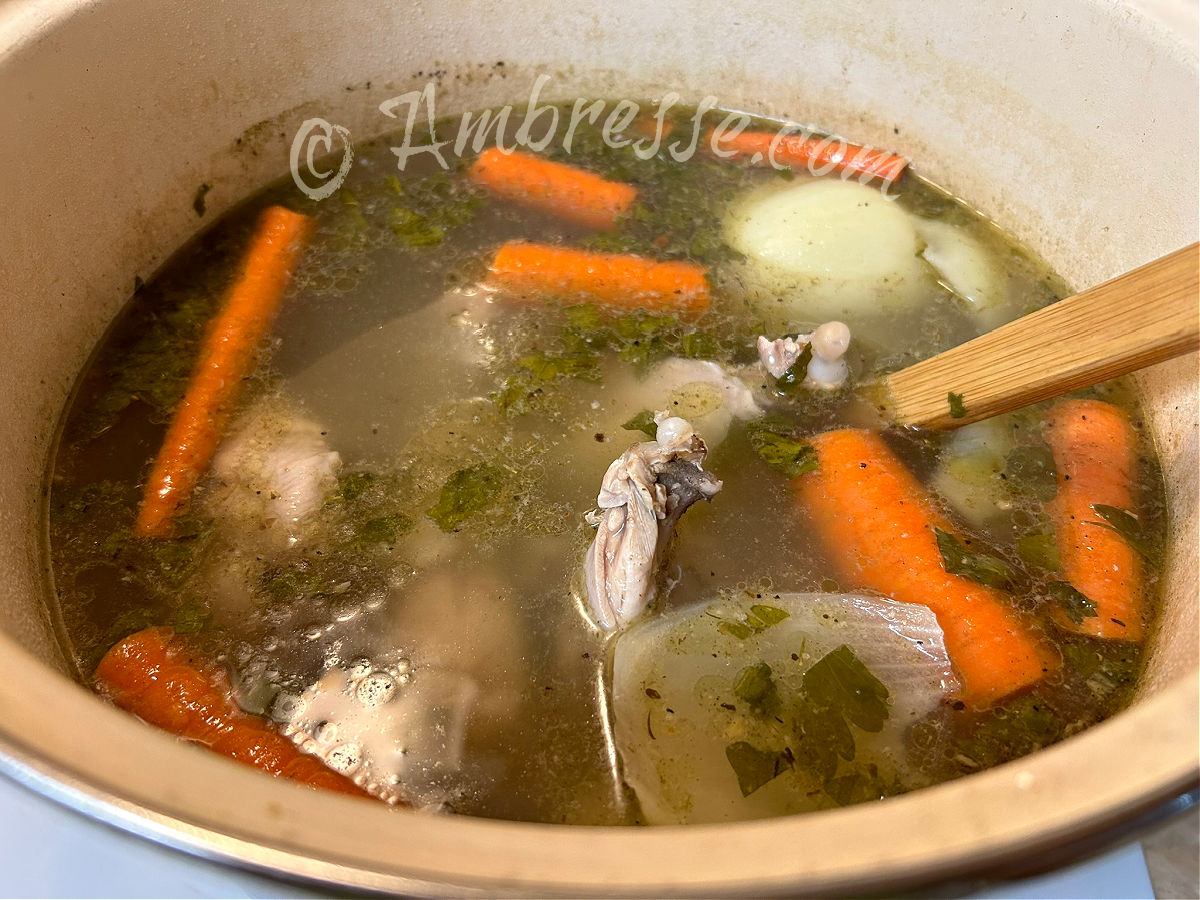 Bones, broth, and veggies simmering on the stove. This will become bone broth in 24 hours (9762).